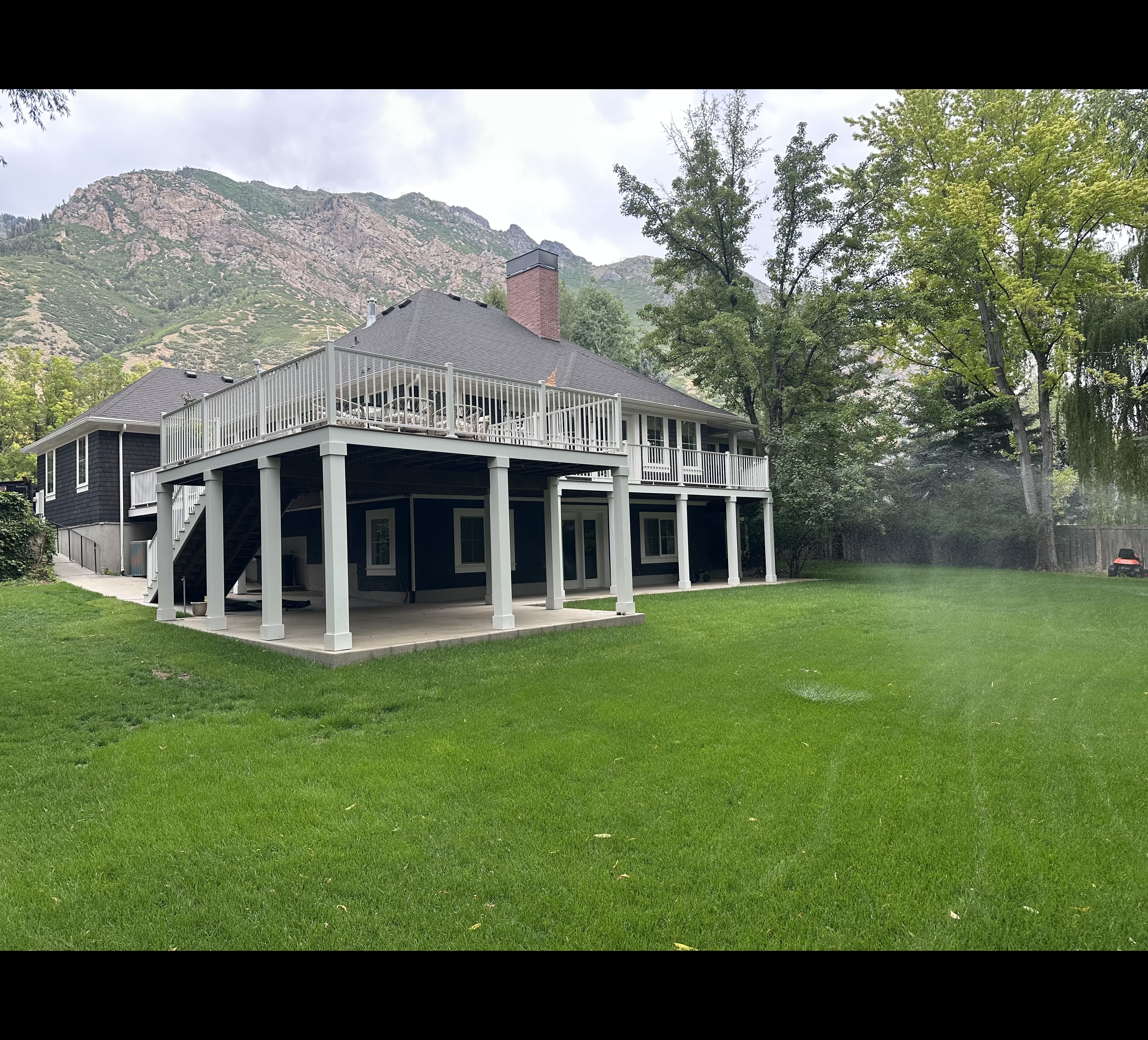 Outdoor beam deck with structural framing visible